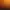 Couchant de soleil sur l'océan avec des îles en silhouette à l'horizon